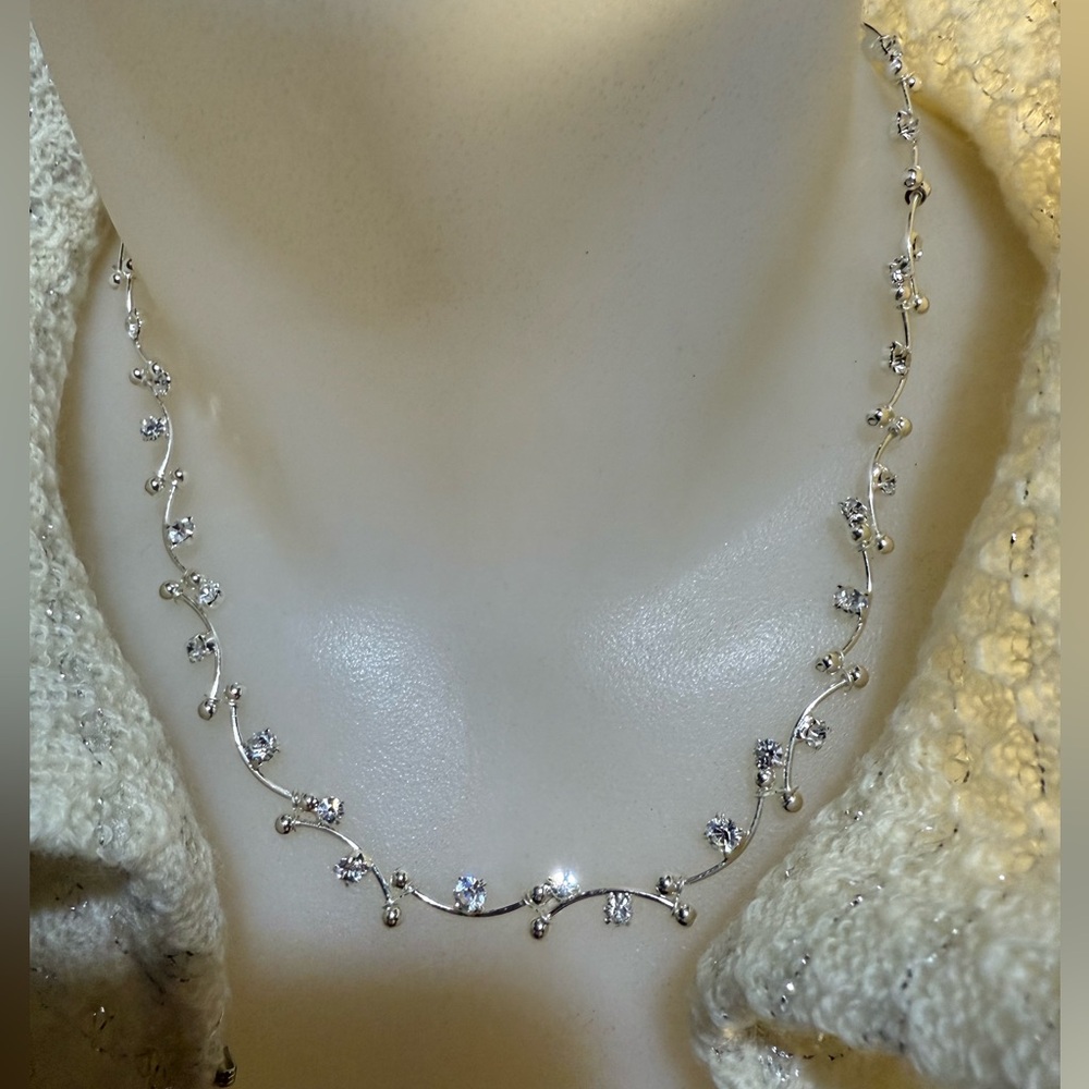 Elegant Silver Necklace with Crystal Accents. NWT. 

19pm.